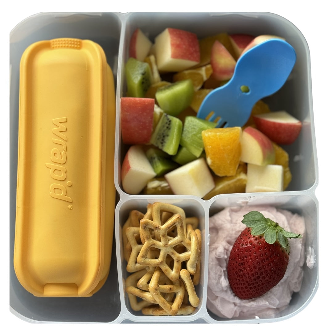 Fresh lunch in bento style lunchbox with Wrap'd wrap holder