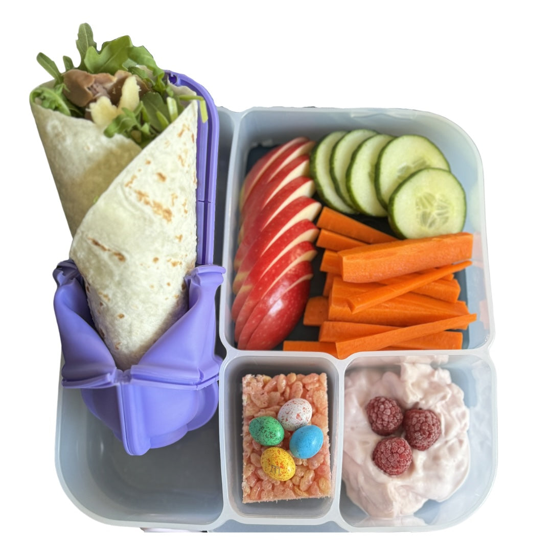 Fresh wrap, veggie sticks and yoghurt for healthy food on the go