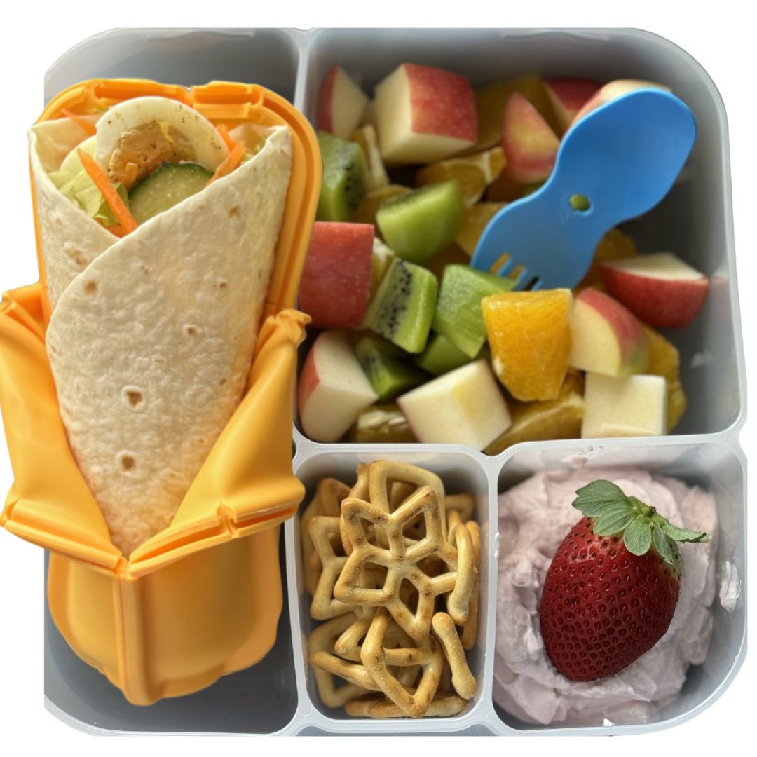 Wrap in a sunshine Wrap'd with fruit yoghurt and pretzels school lunchbox